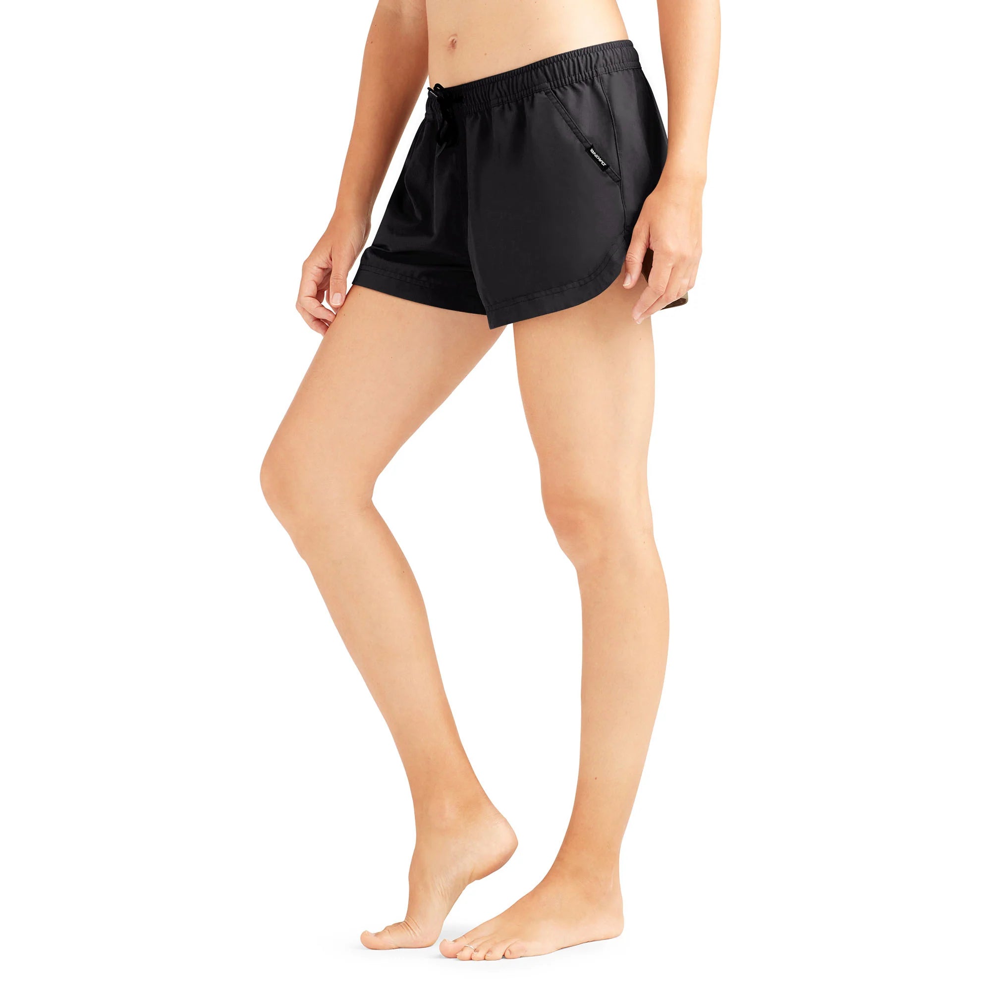 Black DAKI MAE women's boardshorts for all-day summer style, featuring a comfy cotton and nylon blend with elastic waist for easy swimsuit transitions.