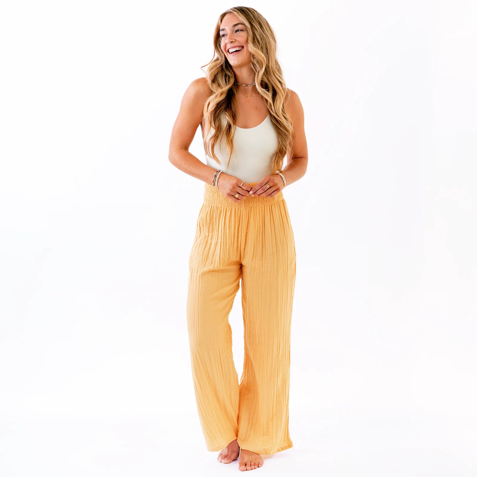 Lotus and Luna wide leg cotton pant in sunrise color, crafted with 100% cotton for comfort, perfect for beach lounging or a day out with friends
